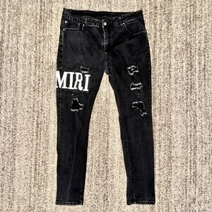 Amiri Embroidered Logo Jeans in Aged Black Size 32